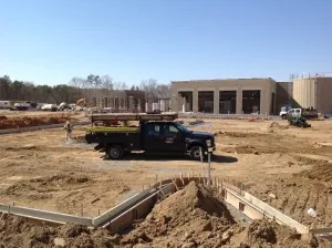 Read more about the article CONCRETE CREW PERFORMING CURB & CUTTER BEFORE PAVING AT WAL-MART IN ORANGE VA.