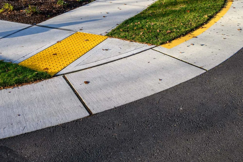 Sidewalk Ramp to Curb